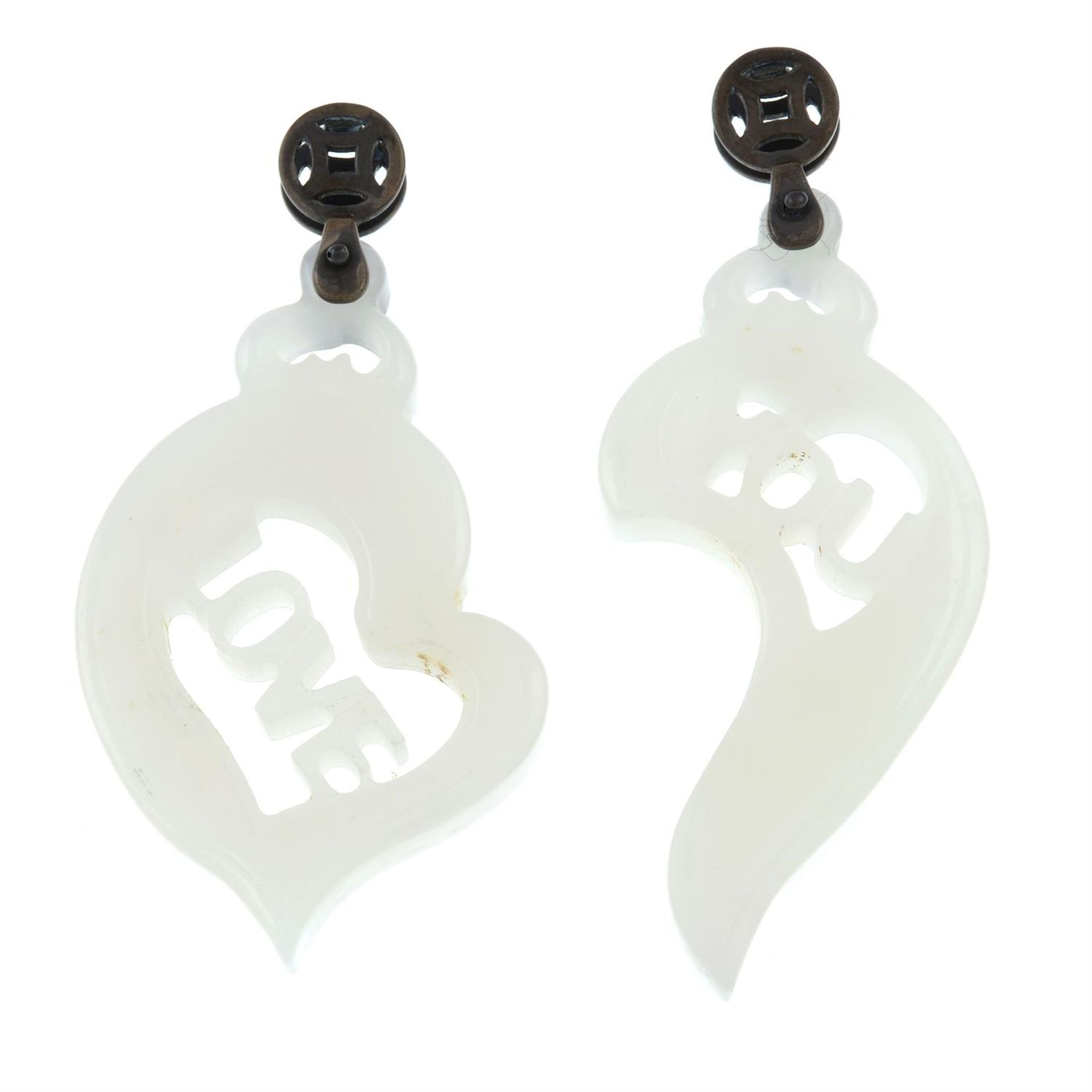 Two jade pendants.