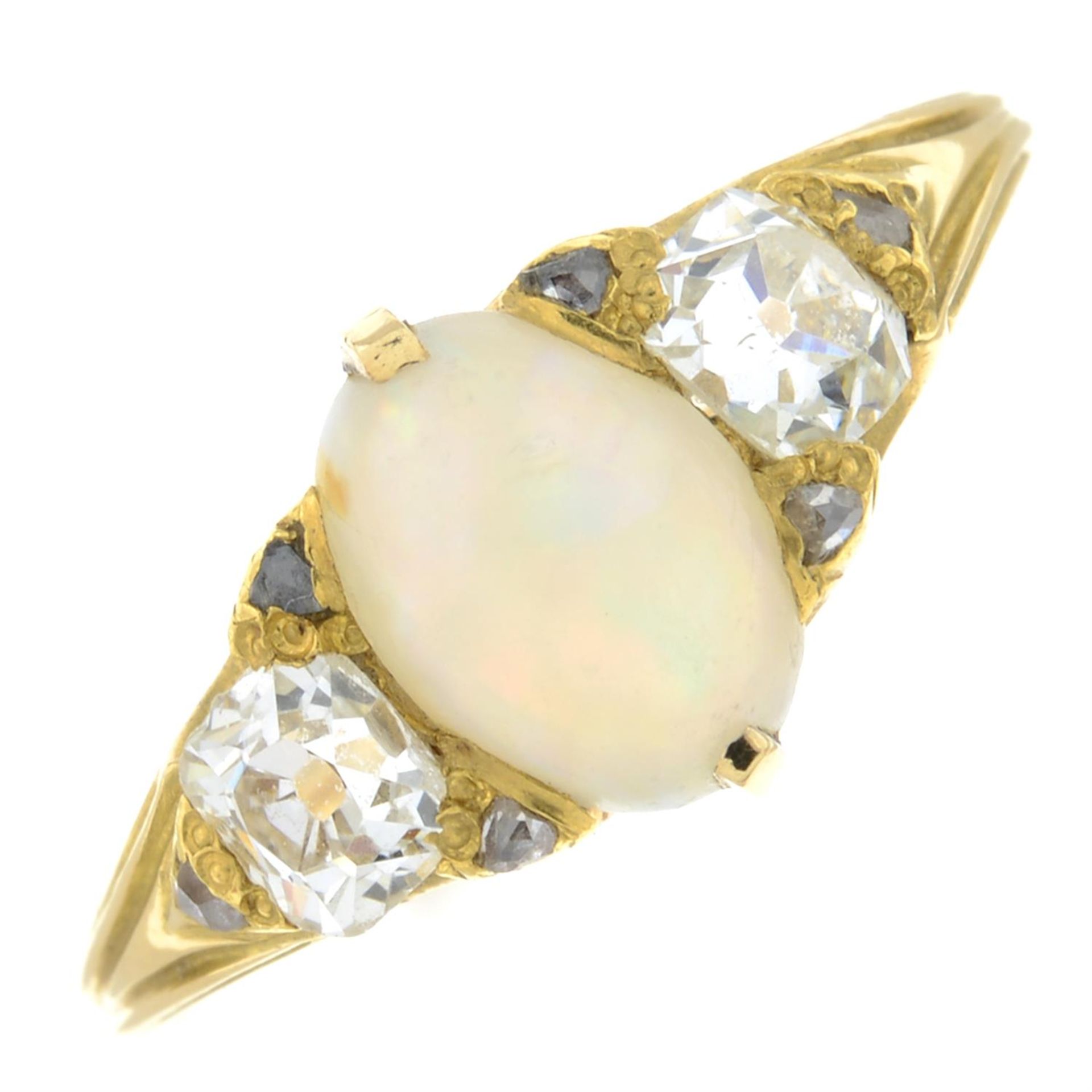 An opal and old-cut diamond three-stone ring.