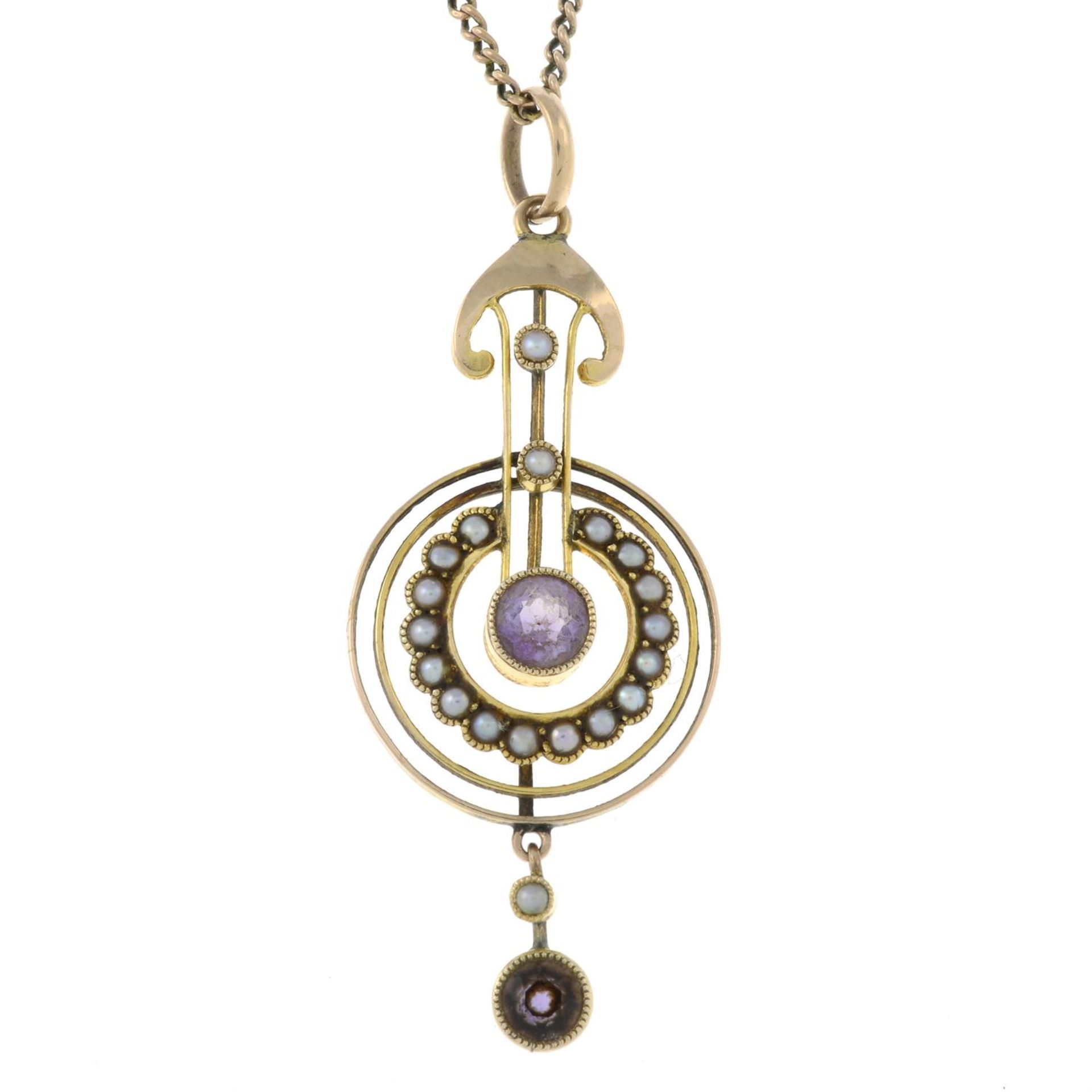 An early 20th century 9ct gold amethyst and split pearl pendant, suspended from an early 20th