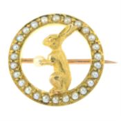 An early 20th century 18ct gold seed and split pearl rabbit brooch.