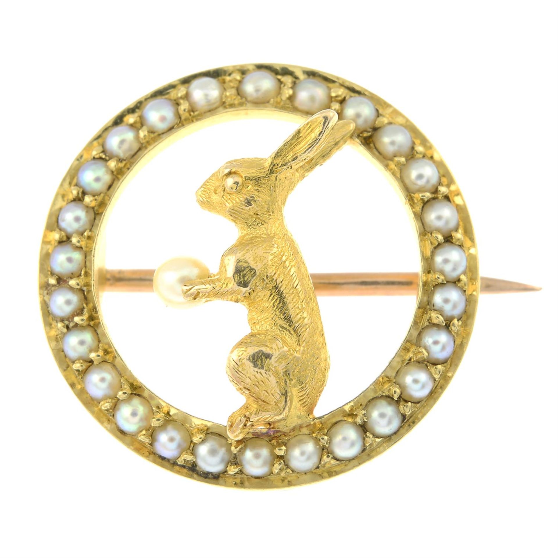 An early 20th century 18ct gold seed and split pearl rabbit brooch.