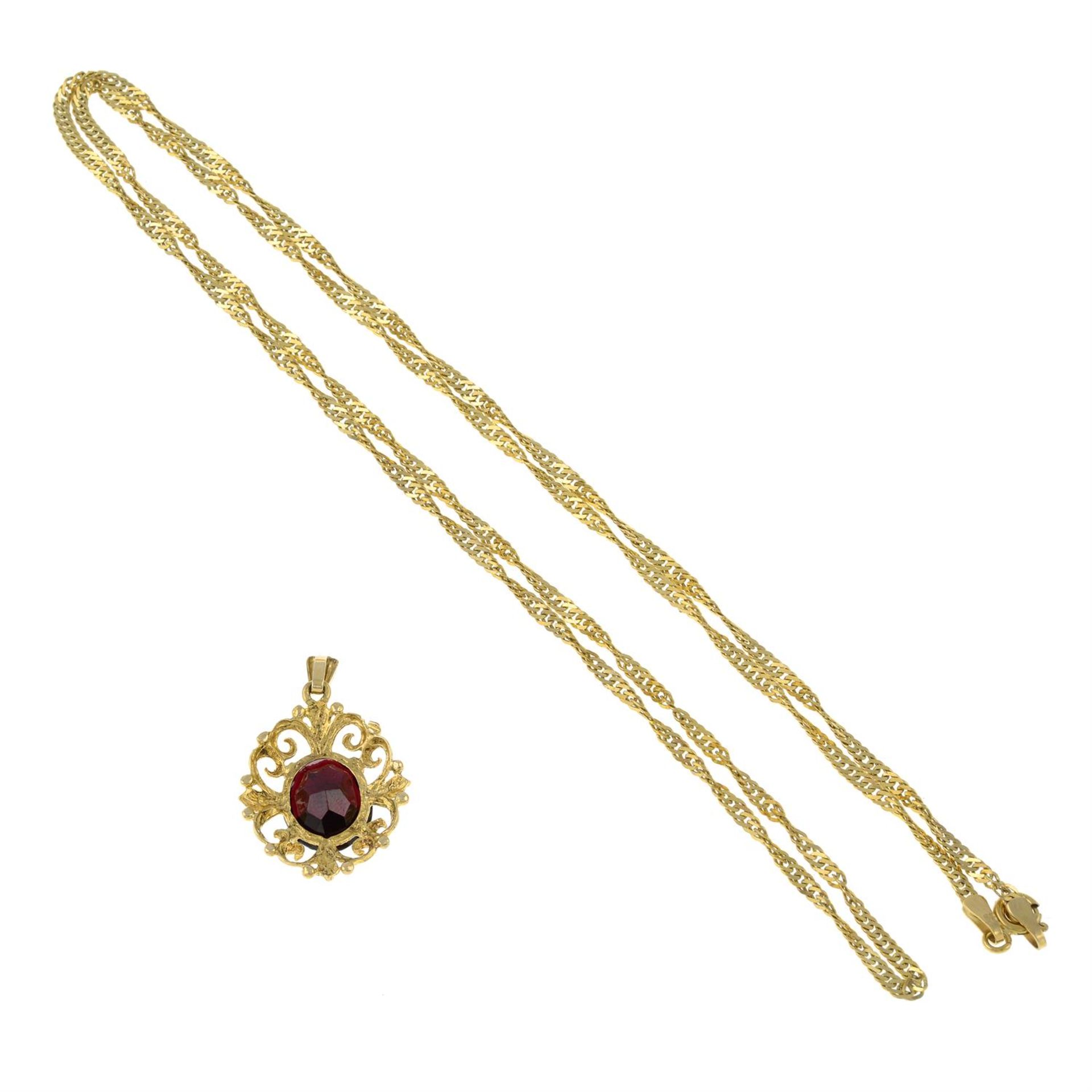 A 9ct gold garnet pendant, with a 9ct gold chain. - Image 2 of 2