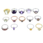 A selection of fourteen gem-set rings.