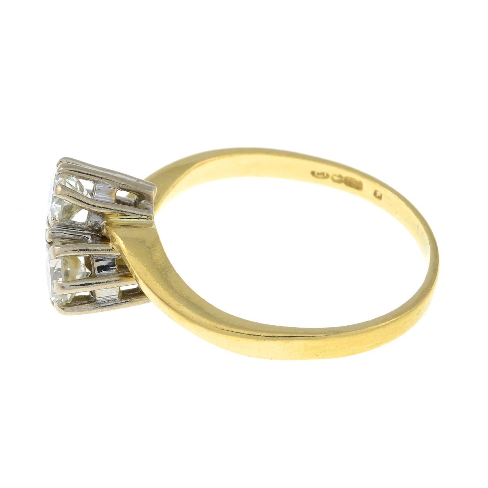 An 18ct gold diamond two-stone ring. - Image 2 of 3