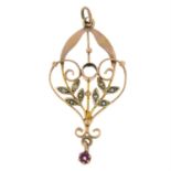 An early 20th century seed pearl and purple paste pendant.