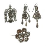 Three mid 19th century steel cut jewellery items.