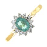 An 18ct gold emerald and single-cut diamond cluster ring.