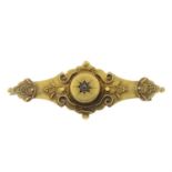 An early 20th century 15ct gold brooch, with cannetille detail and diamond accent.