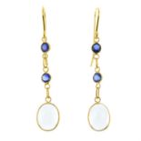 A pair of moonstone and sapphire drop earrings.