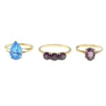 Three 9ct gold gem-set rings.