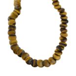 A tiger's-eye disc-shape bead necklace.