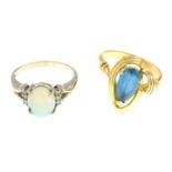 Two opal, diamond and topaz rings.