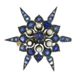 A late 19th century silver split pearl and sapphire star brooch.