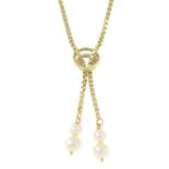 A cultured pearl lariat necklace.