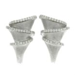 A pair of brilliant-cut diamond tiered earrings.