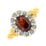 An 18ct gold garnet and single-cut diamond cluster ring.