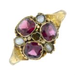 A mid Victorian 12ct gold garnet and split pearl cluster ring.