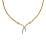 A 9ct gold diamond cross pendant necklace.