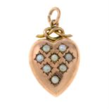 A late 19th century 9ct gold heart-shape locket, with seed pearl highlights.