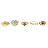 Five 9ct gold gem-set rings.