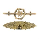 Two late Victorian 9ct gold floral and foliate brooches.