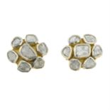 A pair of rose cut diamond floral cluster stud earrings.