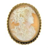 An early 20th century gold shell cameo brooch.