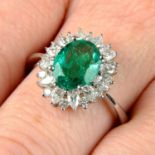 An 18ct gold emerald, pear-shape and brilliant-cut diamond cluster ring.