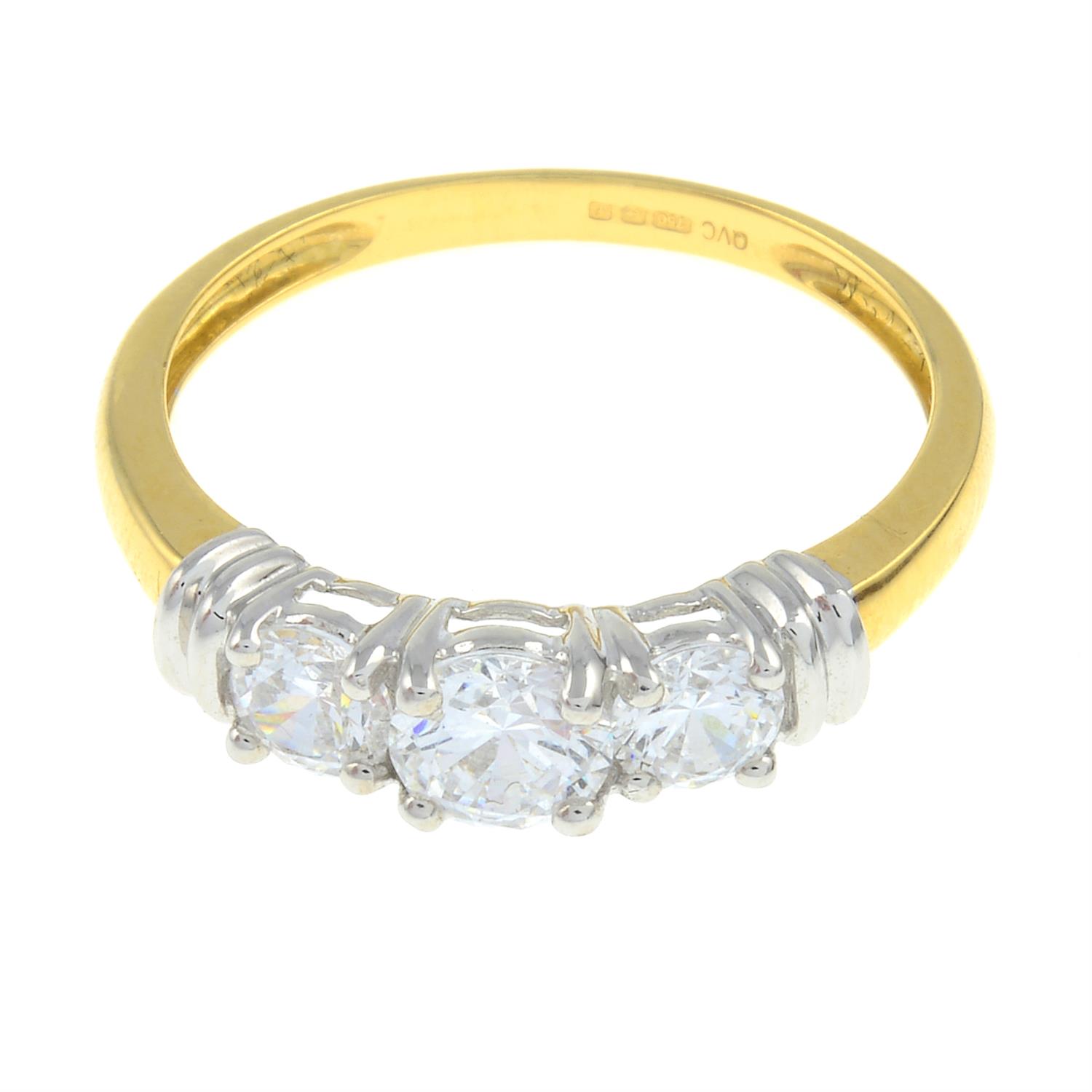 An 18ct gold cubic zirconia three-stone ring.