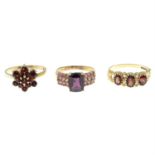 Three 9ct gold gem-set rings.