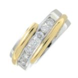 A 9ct gold bi-colour gold diamond seven-stone ring.