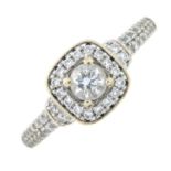 A brilliant-cut diamond cluster ring with diamond shoulders, by Vera Wang.