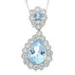 An 18ct gold pear-cut aquamarine and diamond cluster pendant with chain.