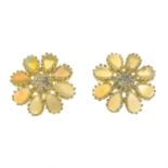 A pair of opal and diamond floral stud earrings.