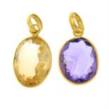 An amethyst pendant and a citrine pendant.