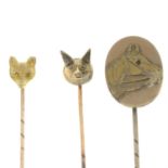 Three stickpin, each designed to depict an animal motif.