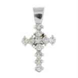 A diamond cross pendant.