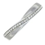 A platinum brilliant-cut diamond set half eternity ring.