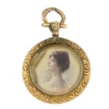 An Edwardian 9ct gold picture locket.