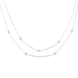 An 18ct gold brilliant-cut diamond two-row necklace.