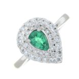 An emerald and diamond pear-shape cluster ring.