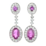 A pair of 18ct gold ruby and diamond cluster earrings with optional suspended cluster.