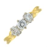 An 18ct gold brilliant-cut diamond three-stone ring.