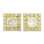 A pair of square-shape and brilliant-cut diamond cluster earrings.