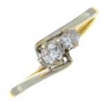 An early 20th century 18ct gold and platinum circular-cut diamond crossover ring.