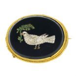 A late 19th century micro mosaic brooch, depicting a dove with an olive branch.