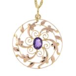 An early 20th century 9ct gold amethyst pendant, suspended from a 9ct gold chain.