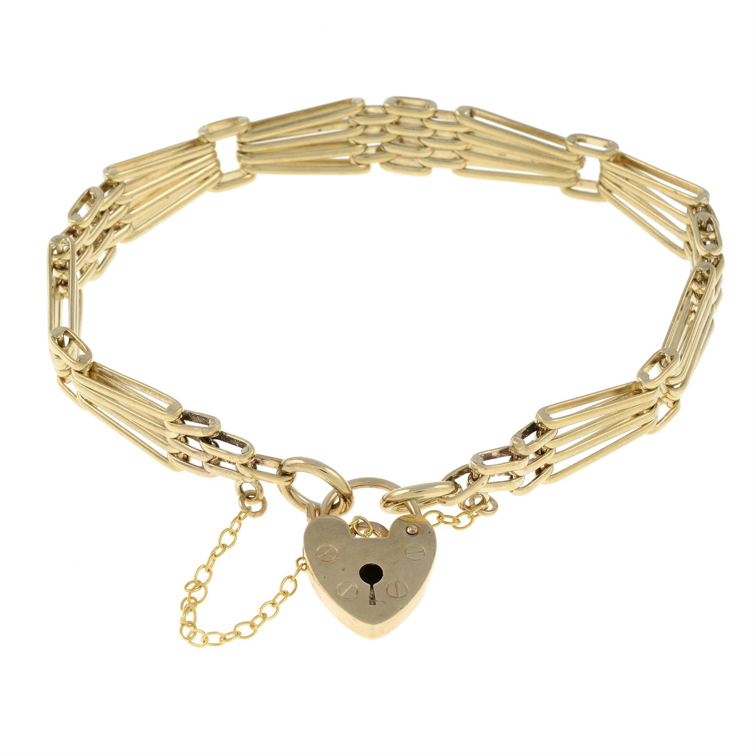 A bracelet, with heart-shape padlock clasp.