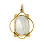 An early 20th century gold mabe pearl pendant.