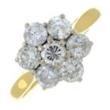 An 18ct gold brilliant-cut diamond cluster ring.